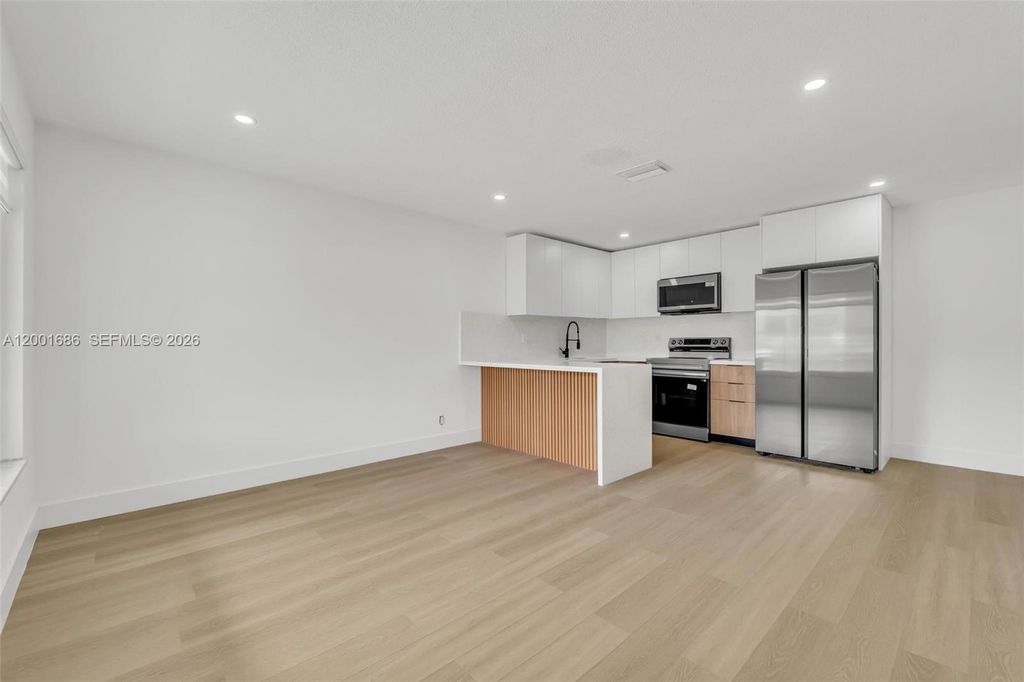 Photo of 1611 NE 50th Ct #2, Fort Lauderdale, FL 33334 (MLS # A12001686)