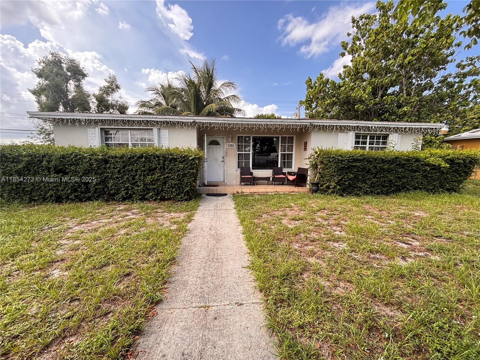 Welcome to your dream home in Miami Gardens! This spacious 4-bed, 2-bath single-family home sits on a desirable corner lot with a generous 10,000 sqft lot, perfect for entertaining, expansion, or creating your own backyard oasis. Enjoy an extra-large family room—perfect for entertaining or relaxing with loved ones. Have peace of mind with a 7-year-old roof & a brand-new A/C unit. The beautifully renovated kitchen features modern quartz countertops, ideal for cooking & gathering with family. Driveway extends inside the fenced yard offering vehicle privacy & security. Investor tip-family room can be converted into an efficiency for extra income! Don’t miss this well-maintained gem offering comfort, space, potential income & value in a prime location close to schools, shops, & major highways!