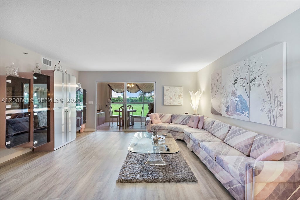 Photo of 5952 Regal Glen Dr #102, Boynton Beach, FL 33437 (MLS # A12088019)