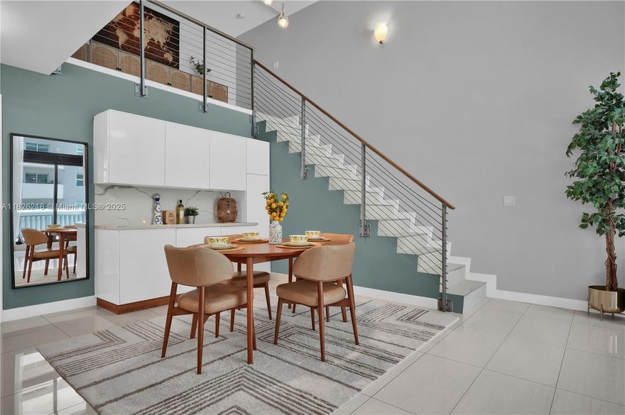 Welcome to a stunning 3 bedroom 3 bath townhouse nestled in a resort-style condo right in the heart of Miami's most vibrant area, Brickell. This 2,000 square foot unique unit features soaring 18-ft ceilings and a sleek modern kitchen with new appliances and a quartz waterfall peninsula. The open-concept living area is expansive and the flow extends seamlessly to a generous private terrace. A bedroom and full bathroom is downstairs while upstairs features a primary suite with a spa-style bath and an extensive third bedroom with a full bath. Enjoy 2 parking spots, 3 resort-style pools, steam room, fully equipped gym, kids' playroom, and unbeatable access to transit, Brickell City Center, dining, and nightlife. This is the best priced 2,000 sq ft condo in the area!