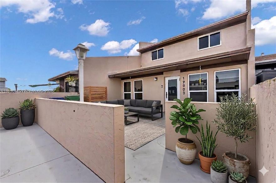 Beautifully renovated 3-bedroom, 2-bathroom townhouse located in the highly desirable Lakes of Acadia community in Miami Gardens. This home features a charming front porch and an enclosed back porch, perfect for relaxing or entertaining. 

 The versatile split floor plan offers three bedrooms and one bathroom upstairs, plus a ADDITIONAL separate one-bedroom, one-bathroom layout downstairs, ideal for multi-generational living or guests.

 Residents enjoy access to community amenities including a swimming pool, tennis court, clubhouse, children’s play area, and well-maintained green spaces.

 Conveniently located near major highways, shopping, and dining, with easy access to all parts of Miami. Nearby public, charter, and magnet school options provide flexibility for a variety of educational needs. 

 Some photos in this listing have been virtually staged to illustrate the home's potential. Measurements and actual room configurations may vary.