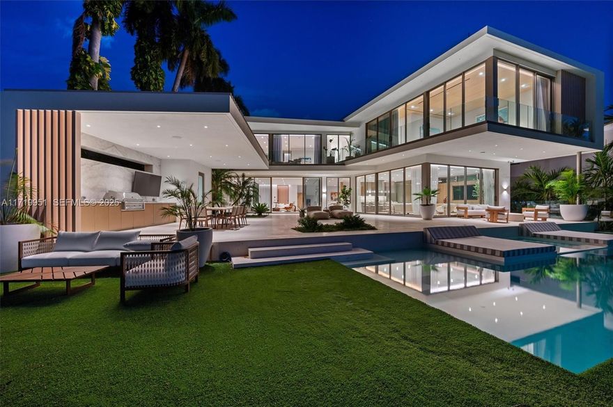 Just completed Nov 2025, this elevated home offers over 9,000 sqft of contemporary living with open water bay views and Miami skyline sunsets. 6 spacious bedrooms, 6 plus 2 half bathrooms, exquisite interior finishes include custom Italian kitchen by Ernestomeda and bathrooms by Casabath. Primary suite offers incredible water views, white oak ceiling, dreamy walk-in closet, bathroom with floor-to-ceiling glass & stone walls. The open floor plan seamlessly transitions to an outdoor oasis, complete with kitchen, dining area, pool & dock on 105 ft of water frontage. The rooftop offers stunning 360 degree views while the understory features a 3-car garage, additional covered parking and elevator access. Located on coveted Rivo Alto Island with walkability to Sunset Harbor.