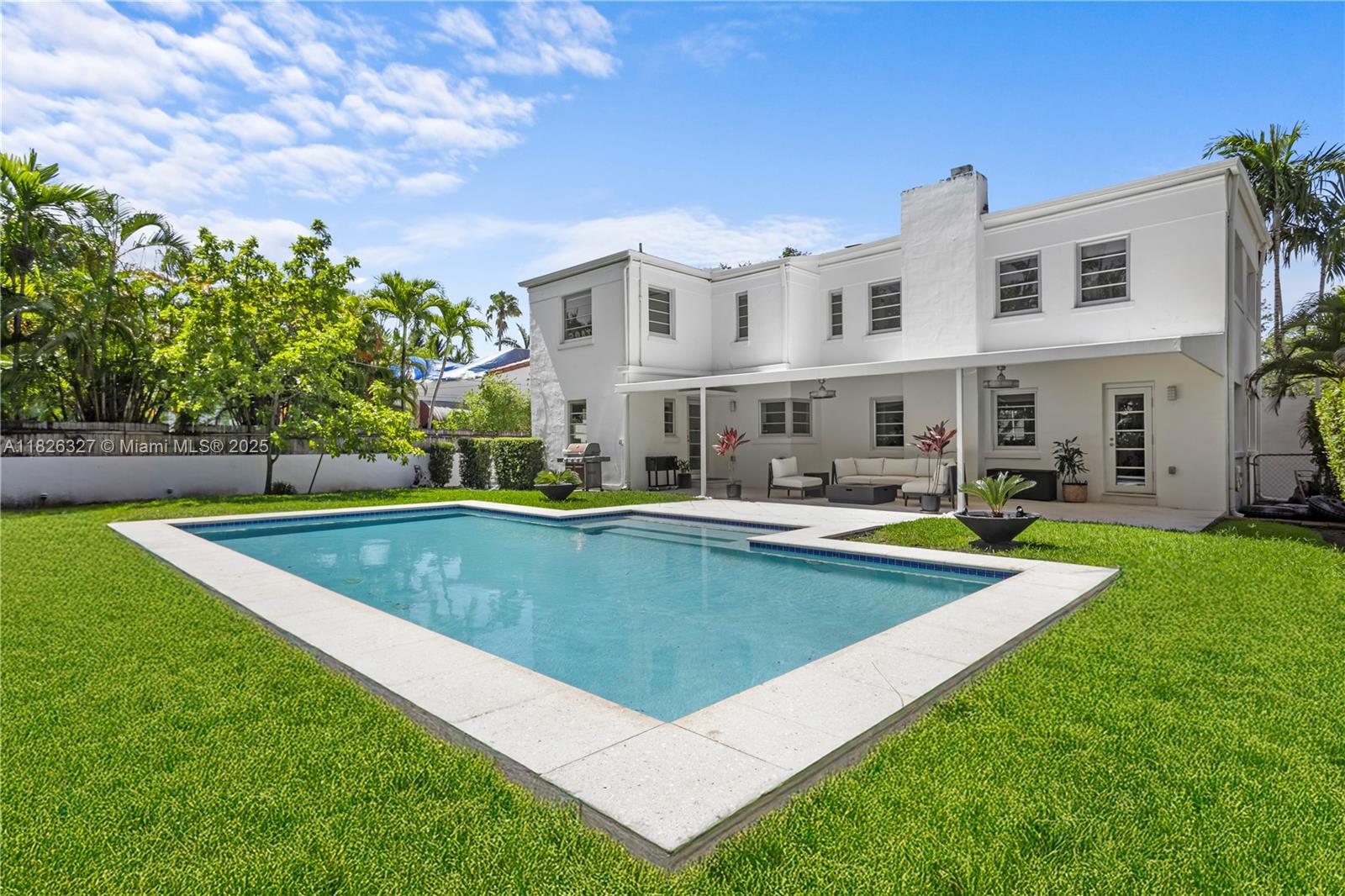 Impeccably renovated 3BD/3.5BA Art Deco home in gated Morningside. Light-filled layout includes living room, sunroom, eat-in kitchen, half bath & laundry room with full bath downstairs. Upstairs: 3 bedrooms with custom closets & a primary suite with motorized shades, walk-in closet & spa-inspired bath. Actual appraisal square footage is 2,726. Private backyard with heated saltwater pool & shaded terrace. Impact windows/doors, 2-car garage & new driveway. Enjoy the ultimate Miami lifestyle near Biscayne Bay, minutes to the Design District, Midtown, Miami Beach & top schools.