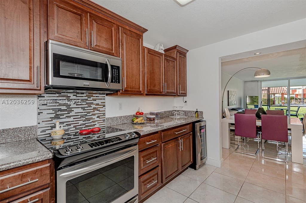 Photo of 9410 N Hollybrook Lake Dr #11-109, Pembroke Pines, FL 33025 (MLS # A12036259)