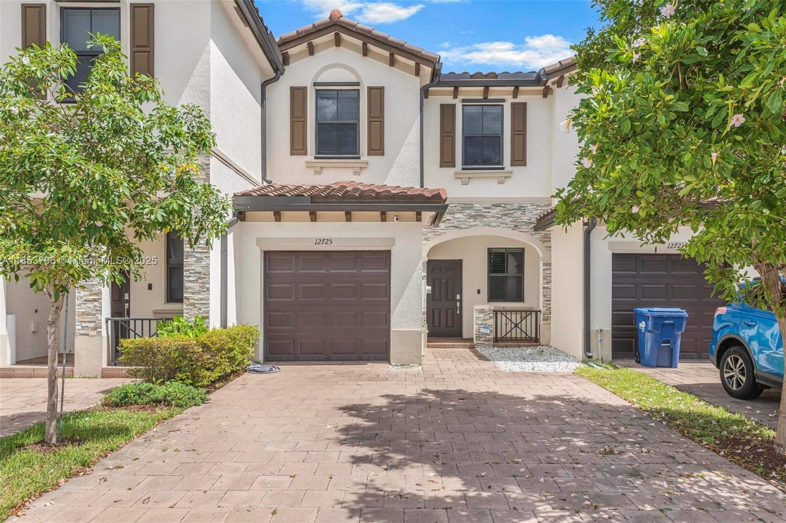 Bright, beautifully maintained, and packed with upgrades—this 3-bedroom 2.5 bathroom townhouse is the perfect place to call home. This two-story gem features stylish upgrades, new flooring + a layout designed for comfort & functionality. The open-concept 2020 build kitchen dazzles w/ crisp white cabinetry & plenty of space for entertaining. A cozy living area flows effortlessly to a private, nicely enhanced patio w/ pavers ideal for relaxing, BBQ's or hosting! Enjoy custom closets in every bedroom, an epoxy-finished garage, and a chic updated powder room. Designer touches throughout elevate the entire space. Located just minutes from Coral Reef Park, The Falls, excellent dining, and with quick access to US-1 and nearby conveniences like Walmart. Move-in ready- schedule your visit today!