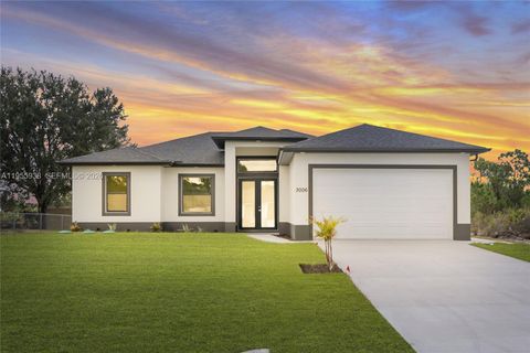 Photo of 3006 53rd St W, Lehigh Acres, FL 33971 (MLS # A11955938)