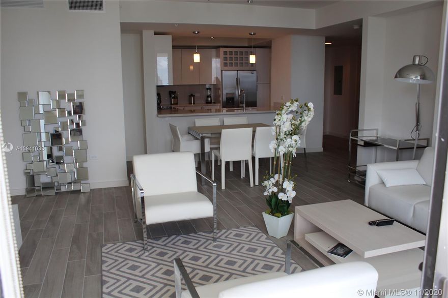 Gorgeous corner unit overlooking Brickell city & bay views. Upgraded ceramic flooring throughout. Built in closets. Very conveniently located at Mary Brickell Village. Right next to grocery,shops, public transportation & restaurants. Black outs installed. 2 parking spaces included. FULLY designer furnished from Artefacto. Ready to move-in! Please text agent for showings.