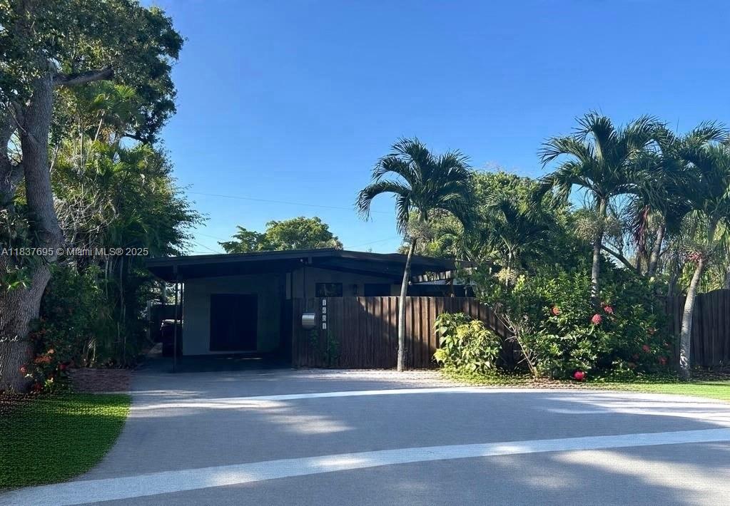 This beautifully updated 3-bedroom, 2-bath home is in a quiet Riverside Park neighborhood with no HOA, just 15 minutes from the beach and 8 minutes from downtown. It offers an open layout with high ceilings, a remodeled kitchen with quartz countertops, island, and gas stove. Living and dining areas feature custom blinds and new ceiling fans. Bedrooms have hardwood floors, and the primary suite includes a bathroom, walk-in closet, private patio and screened lanai. Recent updates include hurricane-impact windows and doors, refrigerator, A/C unit, and modern washer and dryer. Enjoy a large fenced backyard with shady trees, a shed, and large driveway plus front yard parking. Security cameras are installed. Move-in ready and perfect for comfortable coastal living.