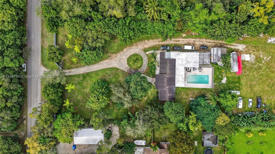 Built Your Dream Home on this Perfect Lot, Lot size 103,673, 2.38 Acres. Centrally located near US1, Redland Markets, Berry Farm, Zoo Miami and Southplace City Center, a large mixed use redevelopment project, coming soon! Home features an open floor plan with 3 split bedrooms, nearly 3,000 square feet of living area. Plenty of fruit trees adorned this 2.38 acre home with spacious 20 X 40 Pool, Deck and BBQ area. 2 Car Garage space, Seperate Shed with One Bedroom, perfect for guest and/or In-laws.