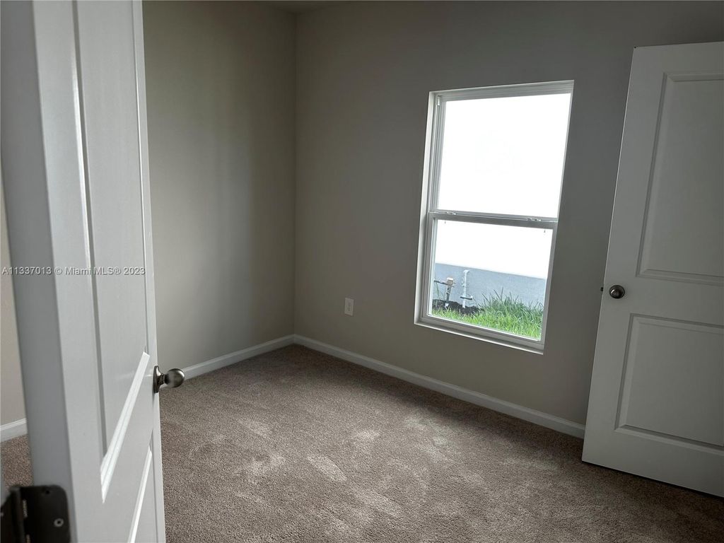 Photo of 604 NE Lychee Ln #0, Fort Pierce, FL 34981 (MLS # A11337013)