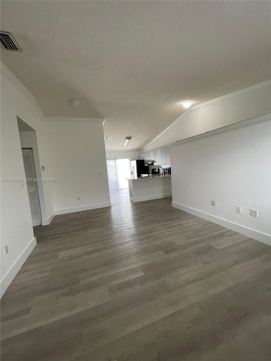 New roof, freshly painted, new washer, dryer, and refrigerator, laminate flooring, closet condo with 2 assigned parking spaces. Prime location near shopping centers, supermarkets, pharmacies, and convenience stores. Ideal for investors with excellent return.This beautifully maintained comfortable living space, ideal for first-time homebuyers, downsizes,or investors.The interior features a spacious open layout with tile flooring throughout,a modern kitchen equipped with stainless steel appliances including a refrigerator ,electric range, microwave, and in-unit washer/dryer.The well-kept,  offers low HOA fees per month,covering exterior maintenance and common areas. With strong rental potential and excellent long-term value, this move-in-ready condo is a great opportunity in one of Hialeah’s most central neighborhoods.