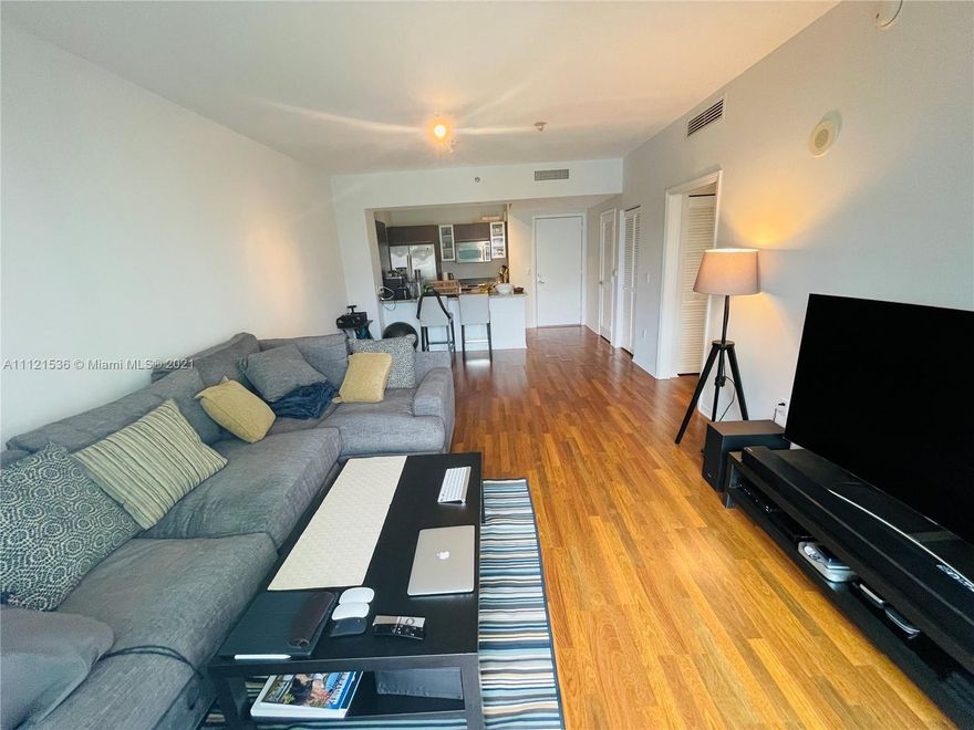 Spectacular 1/1 with amazing pool view. The unit has laminated wood floors throughout the unit. Residence features modern high ceilings, stainless steel appliances ,imported Italian cabinetry Amenities:24 hr security and concierge, 24 hour valet parking, State of the art Fitness Center in each tower, 2 Infinity-edge heated pools, Steam room,Theater room, Business center, party room, pool table & lounge. Walk to Mary Brickell Village and Brickell City Center mall. Water & basic cable included.One assigned covered parking space.