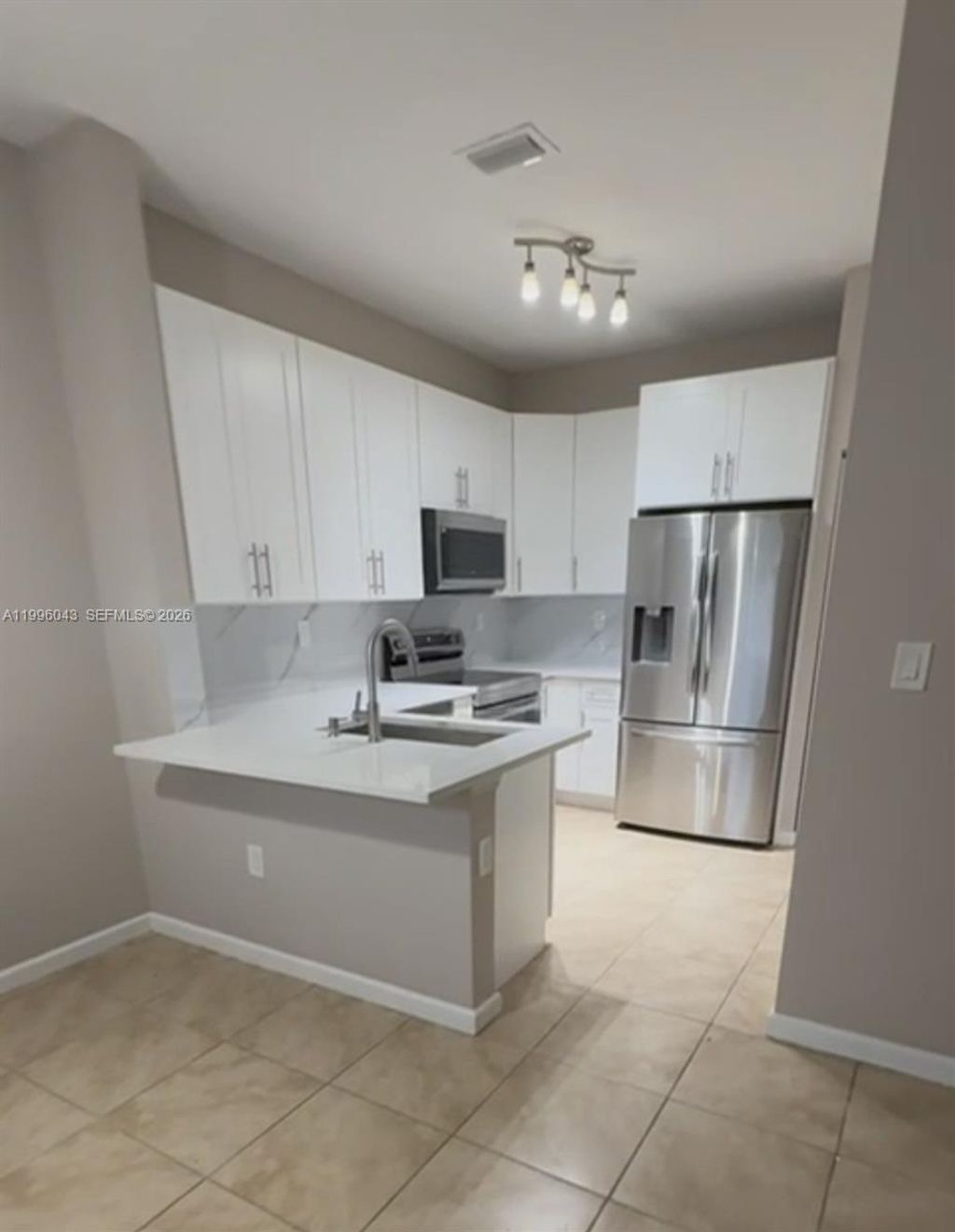 Photo of 3540 NW 30th Pl, Lauderdale Lakes, FL 33311 (MLS # A11996043)