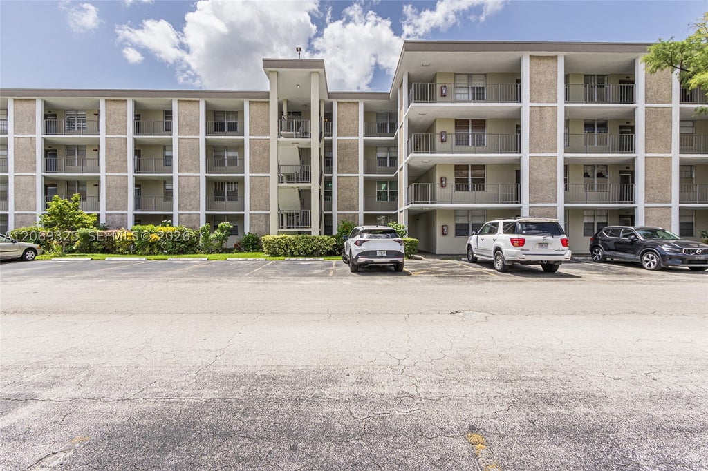 Photo of 2998 NW 48th Ter #432, Lauderdale Lakes, FL 33313 (MLS # A12069325)