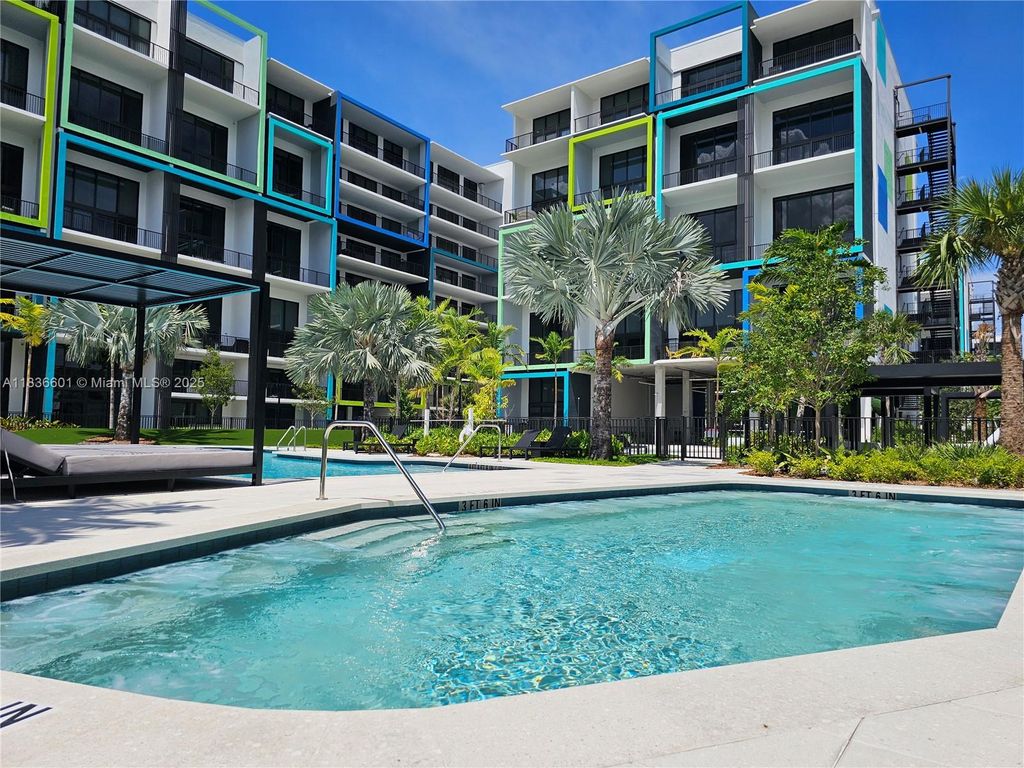 Photo of 4400 Sunrise Blvd #T-1, Plantation, FL 33317 (MLS # A11836601)