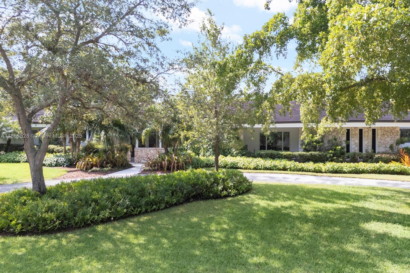 Gorgeous Pine Bay Estates North sophistication and style galore- fantastic Hollub-built family home with soaring high ceilings and windows, an incredible state-of-the-art kitchen (w/tons of storage!), and nice open layout. Modern finishes with full house renovation completed in 2017-2018 including roof, impact glass windows and doors, plumbing, electrical, and more!. Huge open-air patio overhang ideal for entertaining that leads to a spacious and private pool yard area. Lush landscaping, built-in breakfast nook, and gorgeous views from every room. Quiet street in coveted Coral Gables subdivision (with 33156 zip code and Pinecrest schools) and NOT in a flood zone.