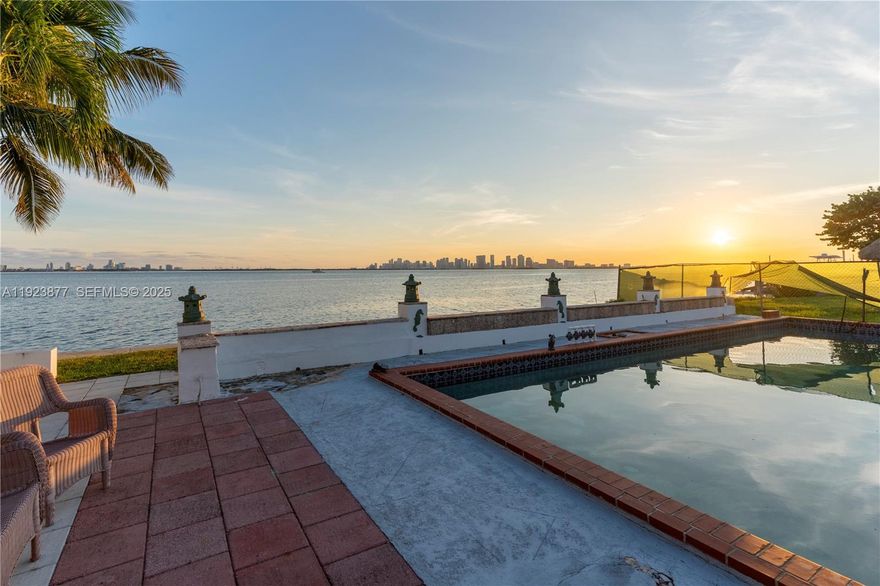 Stunning waterfront property on Treasure Island offering SPECTACULAR PANORAMIC VIEWS of Biscayne Bay, the
Miami skyline, and Miami Beach!! Arguably some of the best views in Miami! With 60 ft of direct bay frontage, no fixed bridges, and wideopen ocean access, this property is ideal for boating enthusiasts. The 4-bed, 4-bath residence sits on a 9,000 SF lot and features vintage Cuban tiles and hardwood floors. Enjoy as is, renovate, or redevelop into your dream estate with some of the best views in Miami. Just blocks from Normandy Shores Golf Course. Unforgettable sunsets and 180 degree unobstructed vistas - an exceptional opportunity.