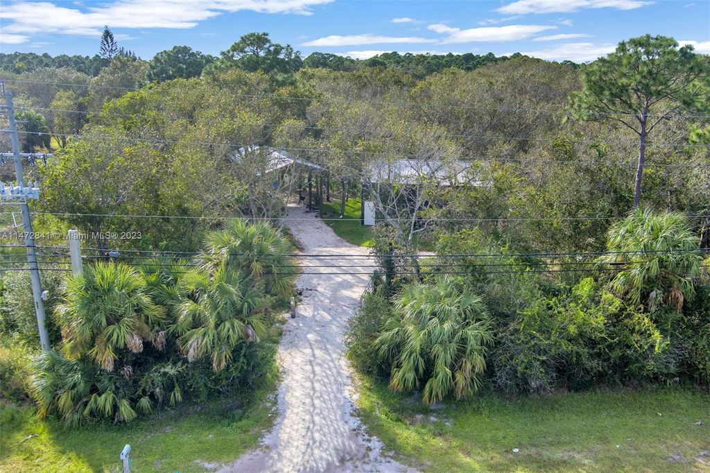 Photo of 2465 Johnston Rd, Fort Pierce, FL 34951 (MLS # A11472841)
