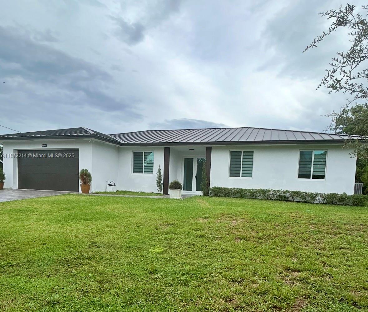Price to SALE! Custom built 2024 Single family home 4 bedrooms 3 full bathrooms in a highly desirable location with NO HOA & NO CDD. This home features an open concept, metal roof, impact windows/doors, high ceilings, 8’ interior doors, large kitchen island, stainless steel appliances, quartz counter tops, high quality kitchen cabinets, modern bathrooms, LED smart home lighting, custom closets, stamped concrete drive way plenty of room to park multiple cars, 2 car garage, water treatment system. The large master bedroom features a spa-like en-suite bathroom with a walk in shower and double sink. Enjoy the private backyard great for entertaining guest plenty of space to build your dream pool, park a boat & RV. Located near shopping plazas, hospitals, FL Turnpike & Krome