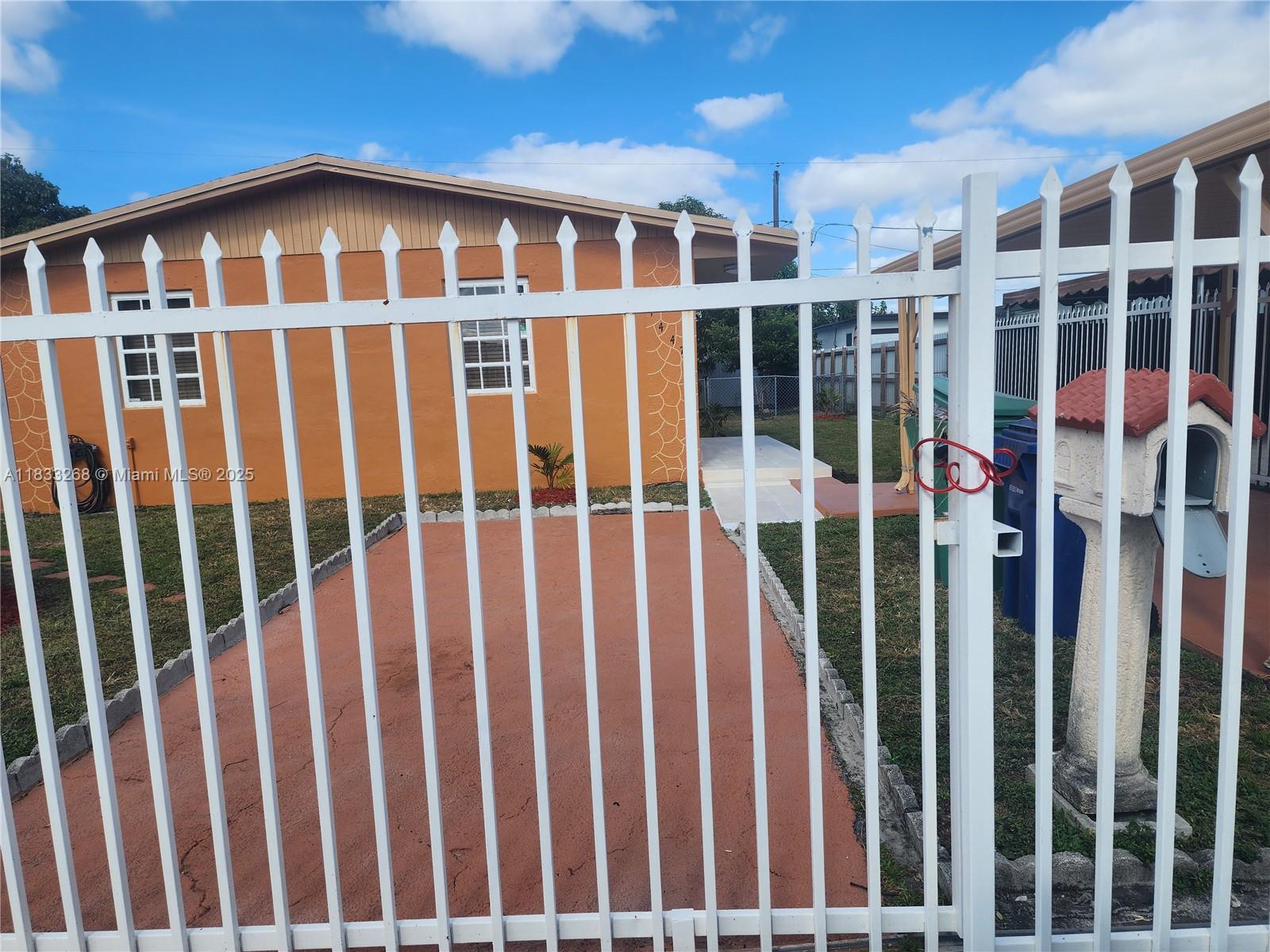 Amazing 3 bedrooms /1-bathroom single family home in a quiet & kid-friendly neighborhood in Miami Gardens: This charming home features: Ceramic tile floors throughout, updated kitchen, spacious rooms, washer & dryer inside the unit, carport for 1 car & large, fenced backyard with fruit trees! Excellent Location, close to shopping centers, restaurants & more! Easy to Show --- NO HOA Approval! No Pets as per the Owner! Show & Rent!