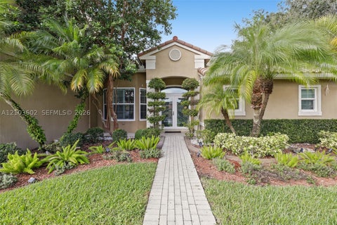 Photo of 1203 NW 127th Dr, Sunrise, FL 33323 (MLS # A12103602)
