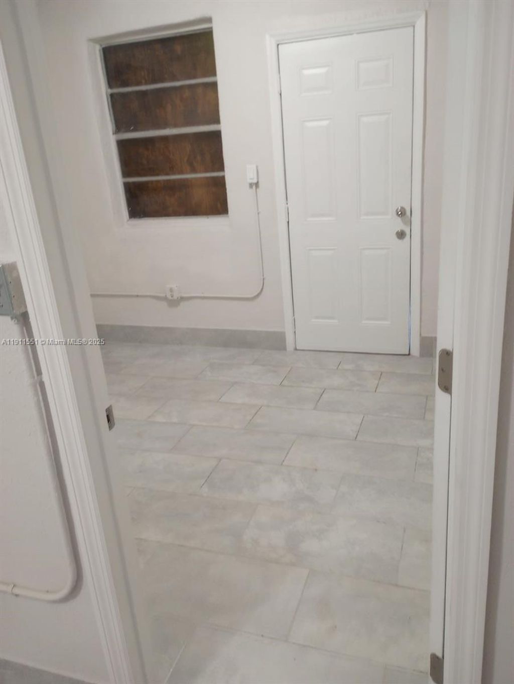 Photo of 1241 W Dr Martin Luther King Jr Blvd W #4, Belle Glade, FL 33430 (MLS # A11911551)