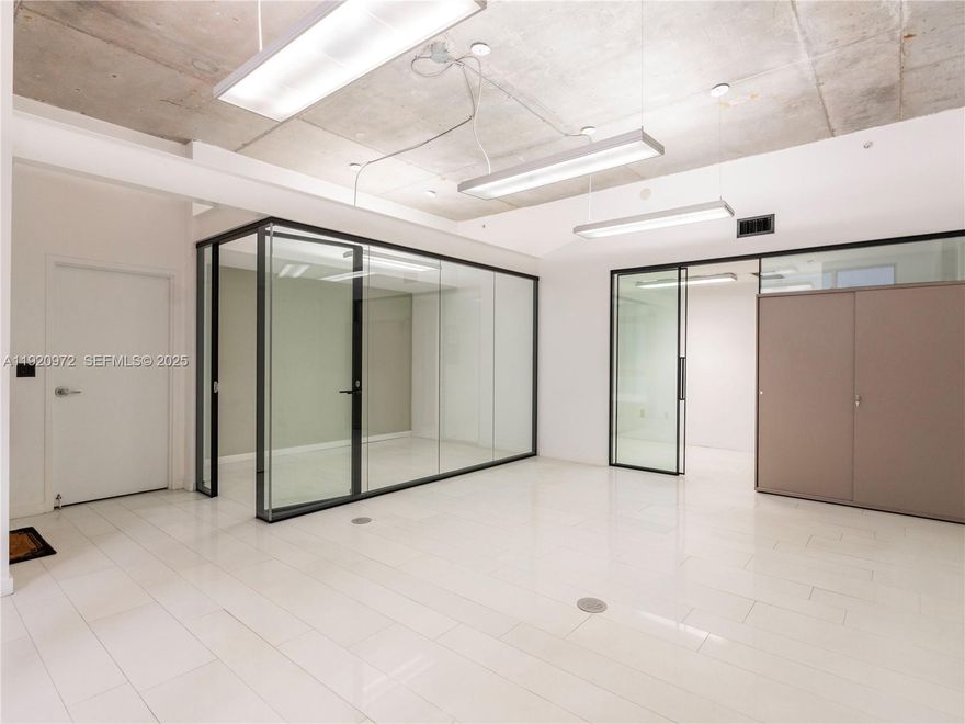 Amazing opportunity for an office/retail/gallery in vibrant Midtown Miami/close to Design District with great exposure and tons of foot traffic. This street level retail space features high ceilings, large windows, tile floors, and bathroom. Perfect for office, gallery, studio, retail, etc. Approx. 650 sqft. Available Jan 1, 2026.