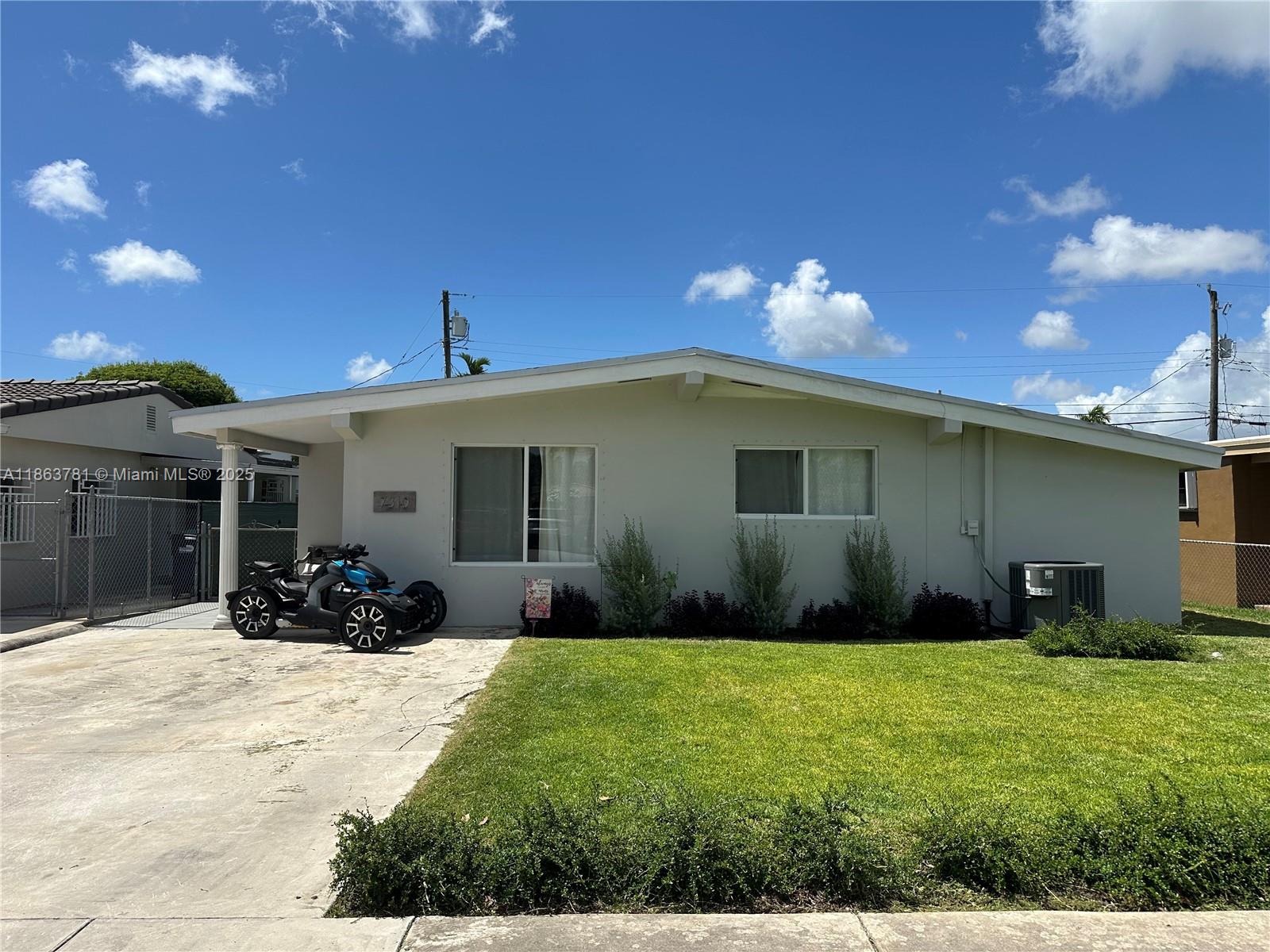 Don't miss the opportunity to make this magnificent house your home. This 4 bedroom 2 bathroom Single Family Residence features a beautifully updated kitchen, custom closets, and hurricane shutters. The peaceful and inviting yard has an avocado tree, pigeon pea (gandules) tree, and banana trees. Centrally located in an amazing neighborhood.