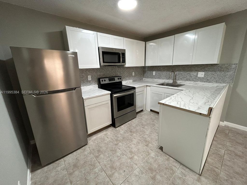 Photo of 11542 NW 44th St #0, Coral Springs, FL 33065 (MLS # A11995384)