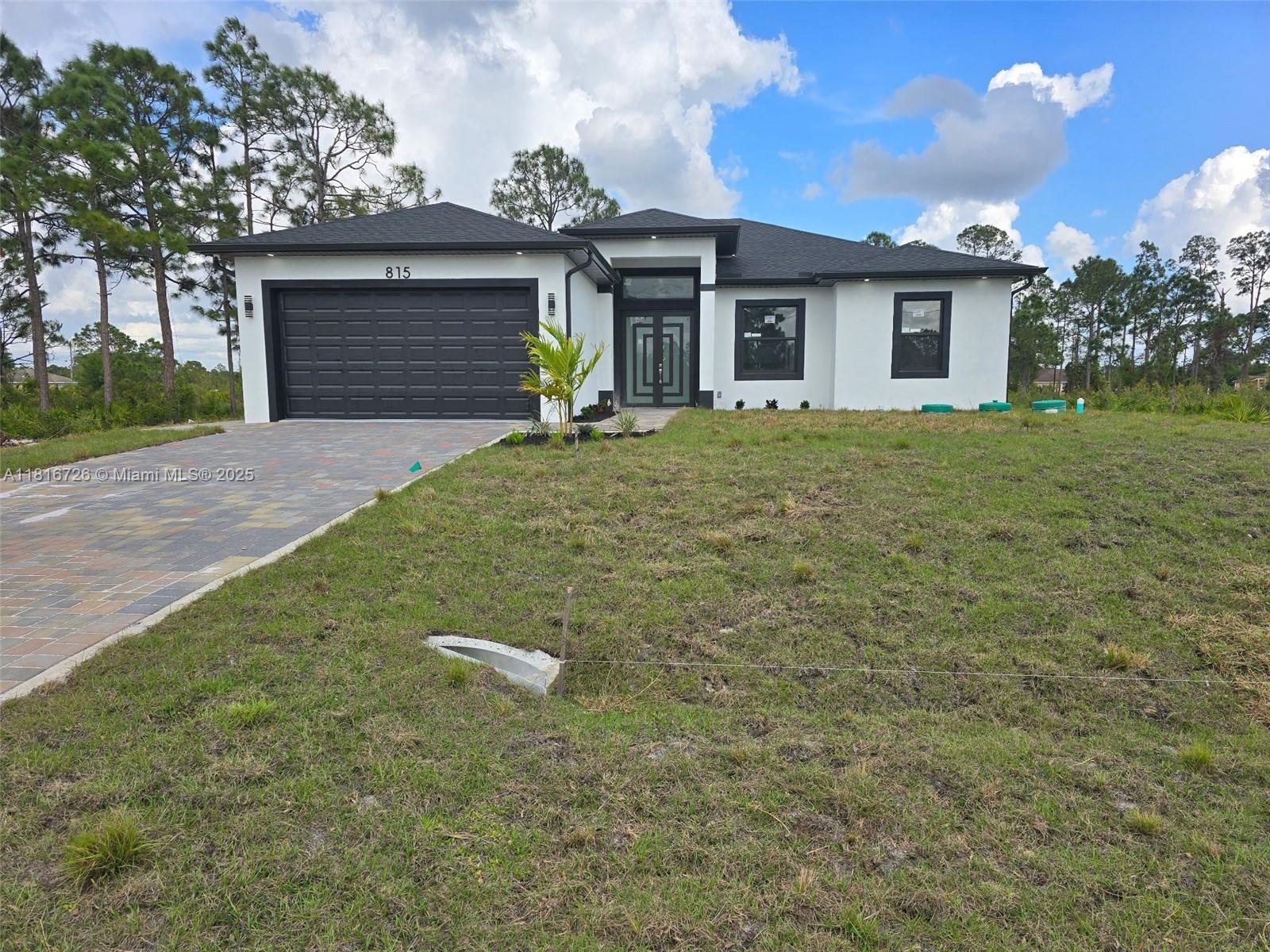 815 Anaconda Ave S Ave, Lehigh Acres, Lee County, Florida - 3 Bedrooms  
2 Bathrooms - 