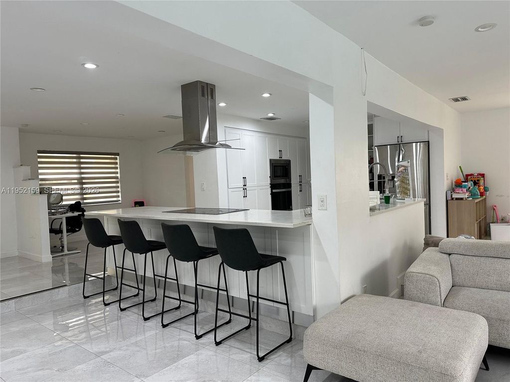 Photo of 10153 SW 51st St, Cooper City, FL 33328 (MLS # A11952159)