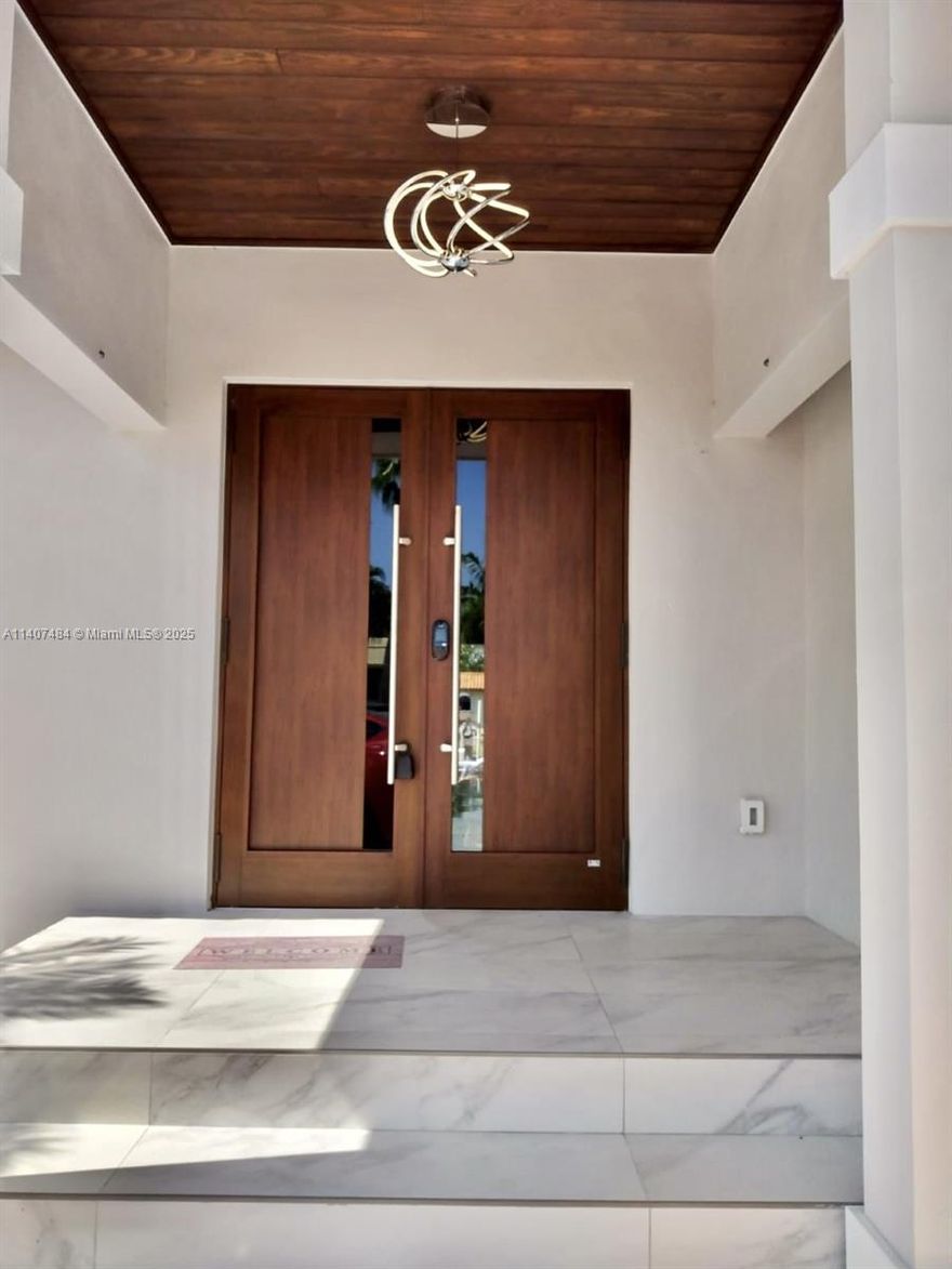 Spectacular Waterfront corner Home on desirable Keystone Island with pool. 4 bedrooms and 3 bathrooms. First floor it has living area, dining area, kitchen, 3 bedrooms and 2 bathrooms. Second floor is the entire master bedroom with full privacy. The property has 90 feet on the water with access to Biscayne Bay, boaters dream.
Price is firm!!!.