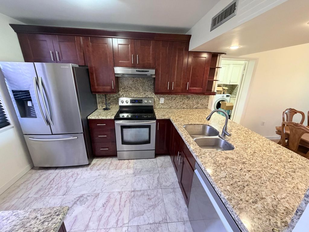 Photo of 1514 Whitehall Drive #206, Davie, FL 33324 (MLS # B26038645)