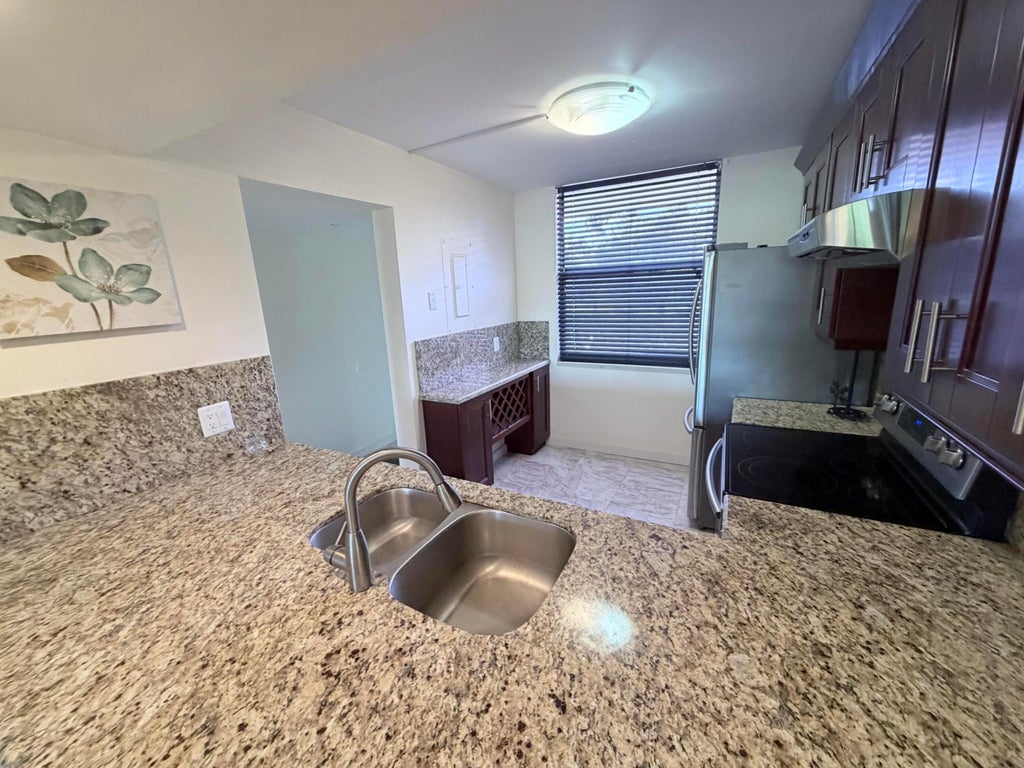 Photo of 1514 Whitehall Drive #206, Davie, FL 33324 (MLS # B26038645)