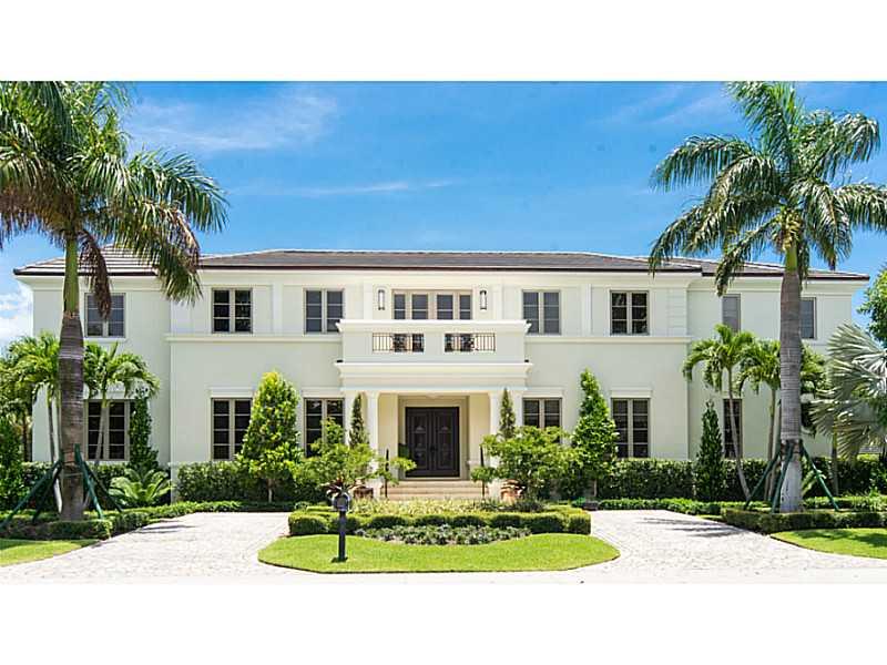 Stunning French-colonial Estate in prestigious Harbor Drive in Key Biscayne on a corner lot - over 15,000 sq.ft - built in 2012. This residence features 8 bedrooms all in suite with balconies overlooking the canal, formal living room, formal dining room,  double height foyer, entertainment room, library, family room and a gourmet kitchen . The master suite features custom build walk-in closet, jacuzzi and separate shower and a large terrace overlooking the canal and infinity pool. A MUST SEE!!