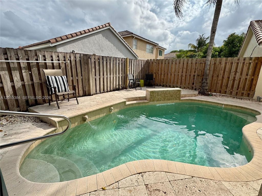 Photo of 6864 Sugarloaf Key St, Lake Worth, FL 33467 (MLS # A12015384)
