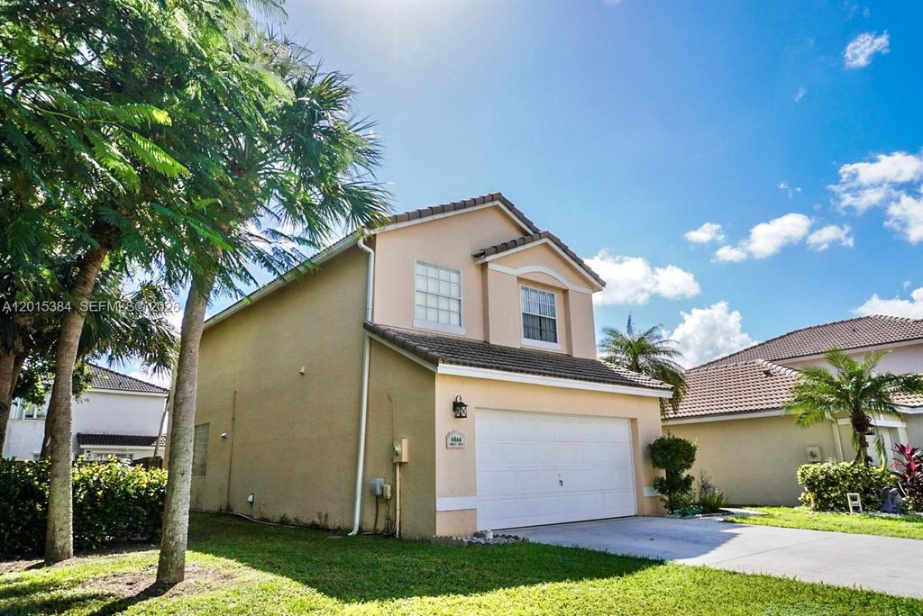 Photo of 6864 Sugarloaf Key St, Lake Worth, FL 33467 (MLS # A12015384)