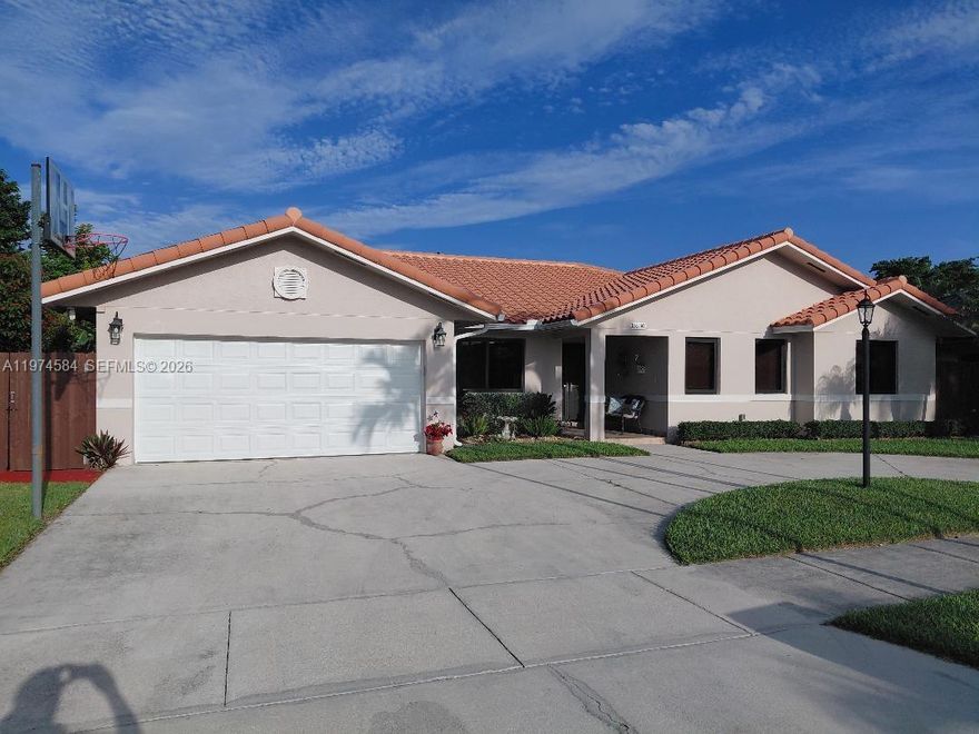 Remodeled 4 bedrooms/ 2 bathrooms + 2 car garage home featuring formal living room, dining room, spacious family room that is open to the kitchen counter with granite countertops. Covered screened terrace to sit outside and relax and enjoy the backyard with plenty of room for a pool. The Primary room is to one side of the hall that has a nice size walking closet and bathroom. the other three bedrooms are to the other side of the hall with the bathroom that goes out to the terrace. This home is energy efficient with solar panels, impact doors and windows. Close to Country Walk, Metro Zoo,  schools , shopping centers and the Florida Turnpike.