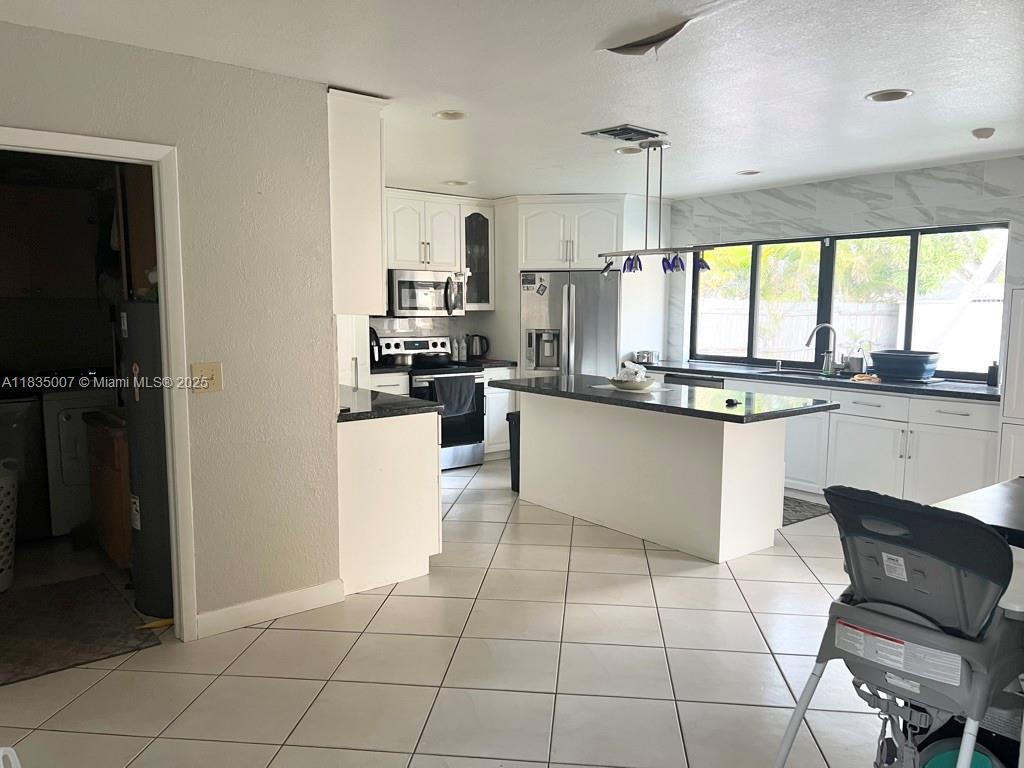 Photo of 7363 NW 49th Ct #7363, Lauderhill, FL 33319 (MLS # A11835007)