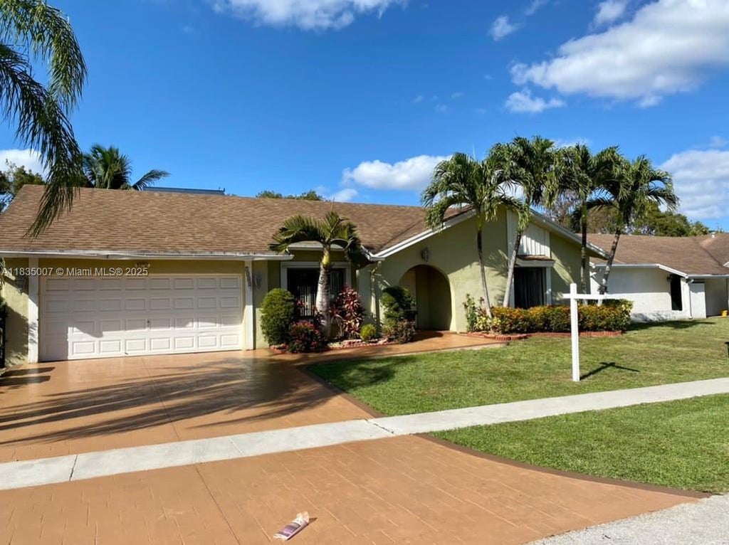 Photo of 7363 NW 49th Ct #7363, Lauderhill, FL 33319 (MLS # A11835007)