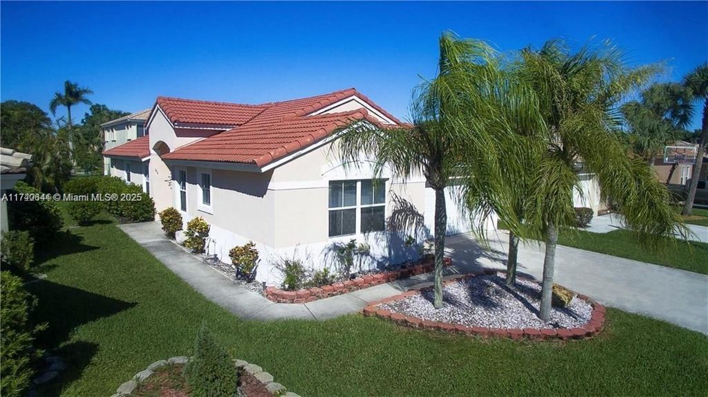 Photo of 20889 NW 17th St, Pembroke Pines, FL 33029 (MLS # A11740644)