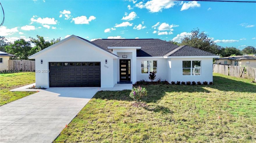 Welcome to 2313 N Olivia Dr—a stunning modern home designed for comfort, style, and the Florida lifestyle you’ve been dreaming of. This beautifully finished 3-bedroom, 2-bath residence features soaring cathedral-vault ceilings, an open-concept layout, and luxury vinyl plank flooring throughout. The gourmet kitchen steals the show with quartz countertops, a designer backsplash, a spacious island, and stainless-steel appliances. French doors open to a covered, tiled lanai with ceiling fan—perfect for enjoying peaceful evenings outdoors.
Every detail has been thoughtfully curated: fans in every room, tile in all bathrooms, a convenient utility sink in the laundry area, and a 2-car garage with a 10x10 attic storage space and stepladder. Located in one of Avon Park’s most desirable neighborhoods, just steps from beautiful Lake Olivia, where you can stroll, unwind, and take in Florida’s serene natural surroundings. A home that truly feels like home from the moment you walk in.