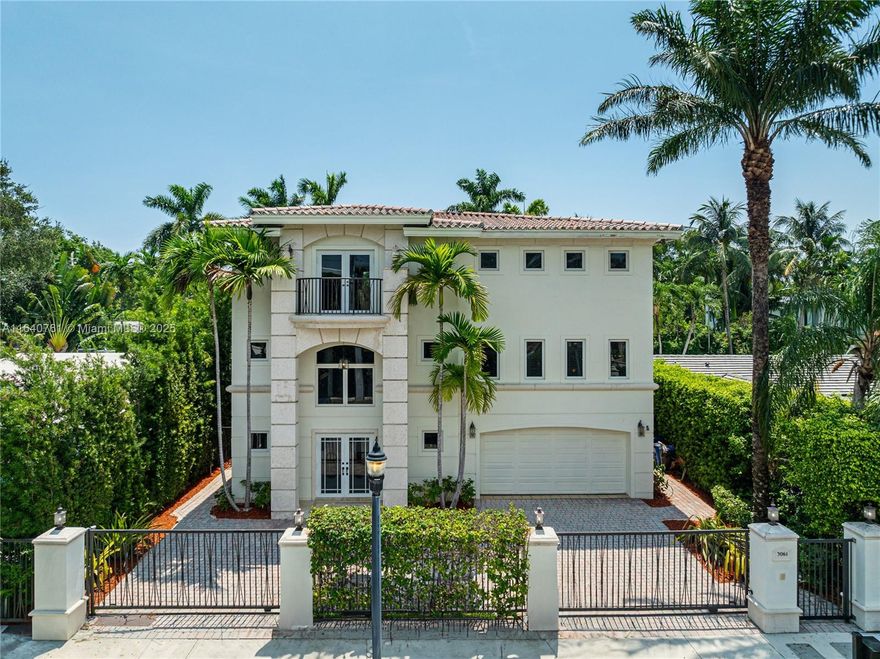 Grand 3-story gated home on prestigious lower North Bay Rd. Enter through the electric gated entrance to find this spacious residence w/8,397 of total space, 7 bedrms, & 5.5 bathrms. The interiors feature elegant living spaces, impact windows/doors, 1BD/1BA staff quarters, dumbwaiter for added convenience, & giant party room that opens to the private backyard w/covered lanai & saltwater pool. The 2nd level has a gourmet eat-in kitchen w/island, bar, midnight kitchen, office/den & terrace overlooking the backyard. The 3rd level includes 4 bedrms w/ensuite baths, & the roomy primary w/dual walk-in closets, balcony & gorgeous bath. 2-car A/C garage. Mins to Sunset Harbour, Lincoln Rd, 41st St, dining, golf, & great schools. Easy access to expressways. 15 mins to MIA Airport! SELLER MOTIVATED!