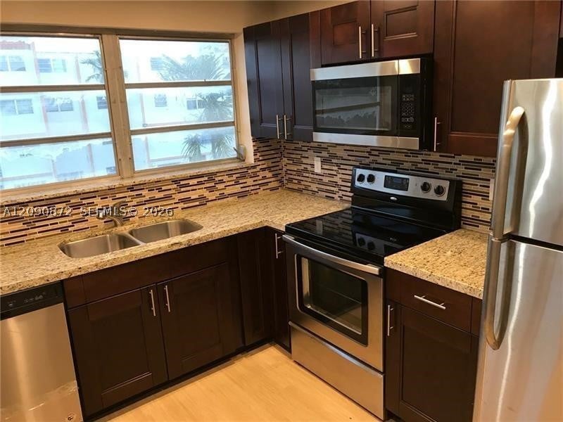 Photo of 2501 NW 41st Ave #302, Lauderhill, FL 33313 (MLS # A12090872)