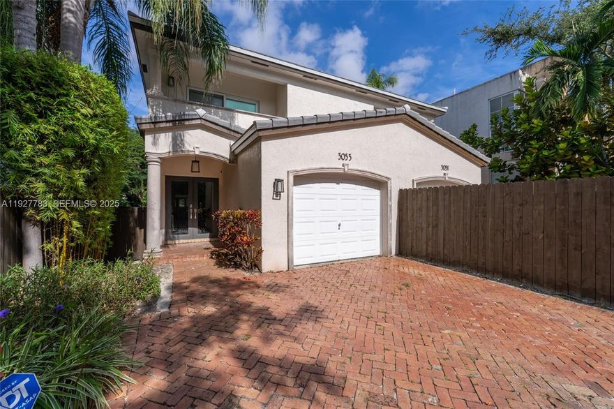 Rarely available and nestled on a quiet, non-through street in the heart of Center Grove, this meticulously renovated 3BR/2.5BA townhome offers a unique hideaway just steps from CocoWalk and A-rated Coconut Grove Elementary. Enjoy a sophisticated interior defined by owner-quality finishes, including smooth skim-coated walls, real wood floors, glass railings, and custom built-ins that create a warm, luxurious atmosphere. The home is offered turnkey with premium furnishings (BoConcept, RH, Sleep Number) ensuring immediate comfort. The lush backyard oasis provides a unique sense of privacy with a motorized retractable awning for year-round indoor-outdoor entertaining. Modernized for peace of mind, the property features impact glass, new roof (2025), new high-efficiency HVAC with UV filtration (Dec 2024), new high-efficiency water heater (2025), and "smart home" technology throughout. Walking distance to everything Coconut Grove has to offer, this residence perfectly balances secluded tranquility with the vibrant Grove lifestyle.