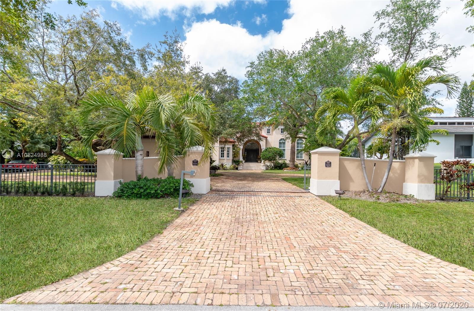 Located in Coral Gables’ exclusive Cocoplum gated community. This beautifully landscaped luxurious two-story Mediterranean home boasts 6 spacious bedrooms, and oversized master with an adjacent office. Convenience at a max with its own elevator; large pool with an expansive covered terrace complete with a courtyard fountain perfect for outdoor entertaining. Double height ceilings make its formal living room the perfect setting for lovely parties or intimate family gatherings. The charming old Chicago brick front driveway leads to its grand entrance with a two-car garage. A must see!
