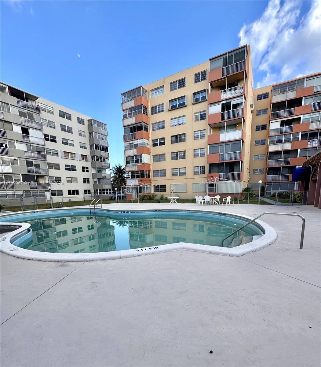 THREE SEASONS CONDO BLDG - Residential