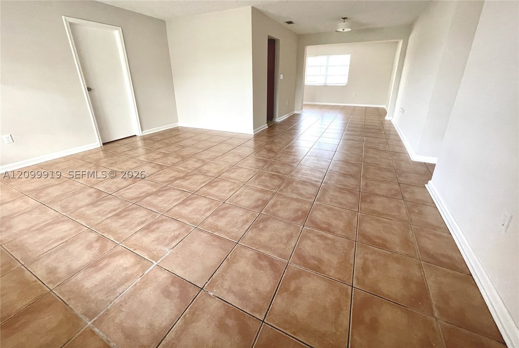 Photo of 8561 Sheraton Dr, Miramar, FL 33025 (MLS # A12099919)