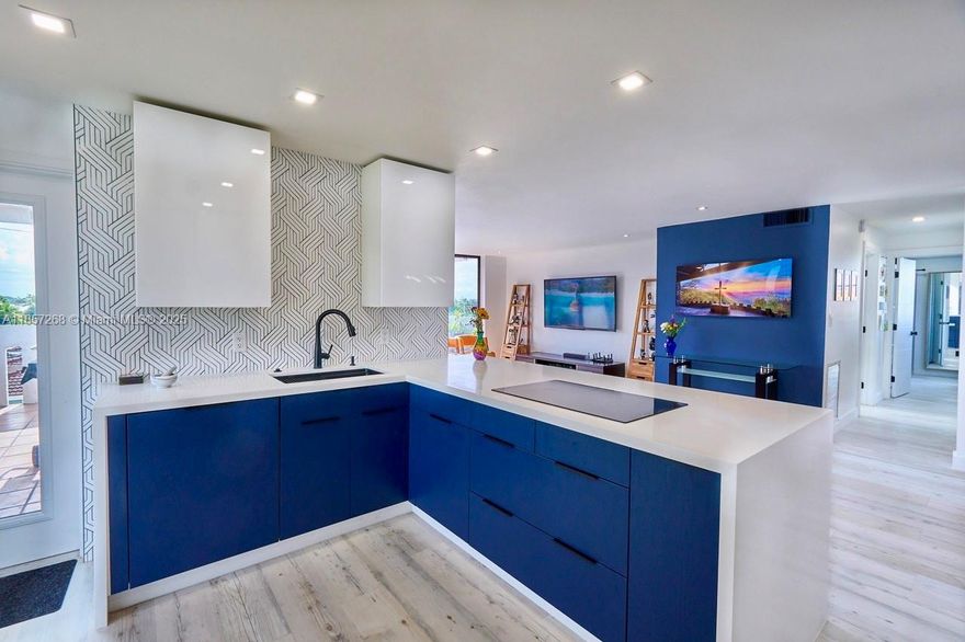 Welcome to this Luxurious Completely Remodeled Art Deco Home in the Exclusive Gated Community of Eastern Shores; surrounded by Multimillion dollar homes! Rarely available Large Corner unit! Expansive double balcony with Panoramic Breathtaking Sunrise and Sunset Views! Direct Ocean Access! Top of the line Cafe' appliances, Jetted Soaker Tub in Master Bathroom, Screen Defog Mirrors ! Prime location! Minutes away from Beaches, Aventura Mall,  Walking Distance to Shops, Restaurants, Oleta River State Park, and much more! Top Rated Schools! Heated community pool! Plenty of guest parking available! Portable Washer/ Dryer in unit! Building certification recently completed! Pet friendly!