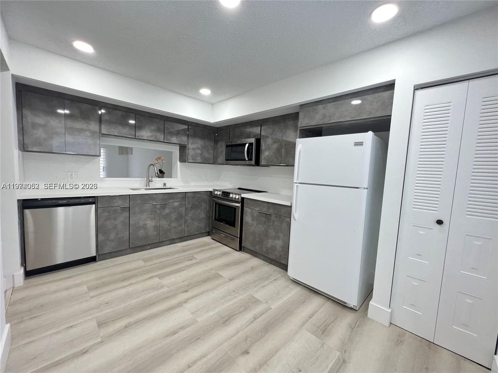 Photo of 1001 SW 128 Ter #406B, Pembroke Pines, FL 33027 (MLS # A11974053)